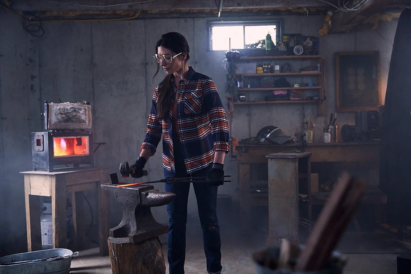 Chelsea Miller at the forge in her workshop