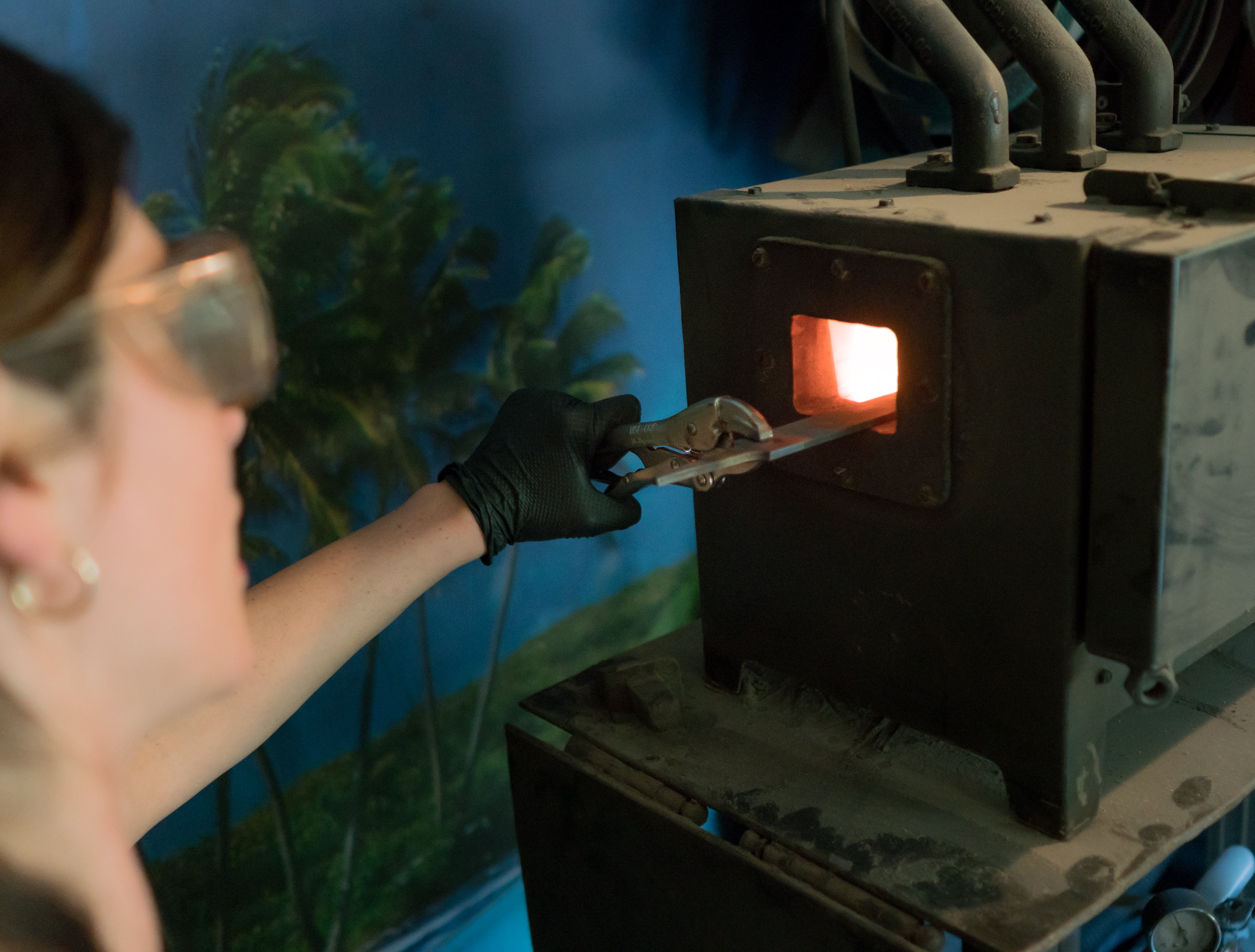 Blade glowing in the forge during heat treatment