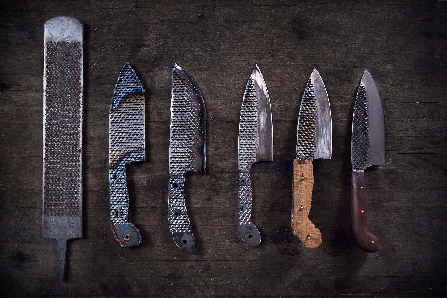 Reclaimed horseshoe rasps sorted on a workbench